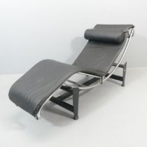 A good quality Italian LC4 Corbusier style black leather tubular steel lounger, marked Fiocci to