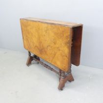 An antique walnut drop-leaf Sutherland table on mahogany base with turned supports. 91x72x17cm (