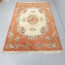 A Chinese red-ground Aubusson rug. 230x150cm.
