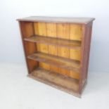 An oak open bookcase, with two fixed shelves. 103x101x33cm.