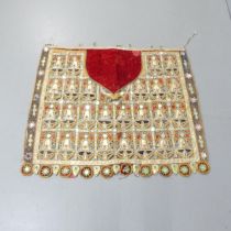 An Indian Toran embroidered wall hanging. 115x95cm.