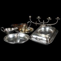 2 silver plated entree dishes and covers, sauce boats, 4-branch table candelabra, etc