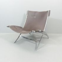 ANTONIO CITTERIO - A mid century brown leather scissor chair by Antonio Citterio for Flexform.