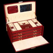 Dulwich Designs, a red leather jewel box, the lid opening to reveal a fitted interior with 3 drawers