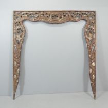 A Chinese hardwood three-section arch, with all-over carved, pierced and mother of pearl inlaid