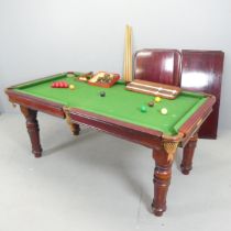 An early 20th century slate-bed quarter size metamorphic snooker / dining table, with label for John