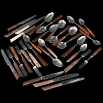 A selection of stainless steel and wooden-handled cutlery, including makers George Butler & Company