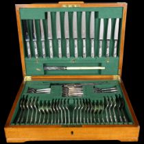 An Art Deco canteen of silver plated cutlery, setting for 6 people, including carving set,