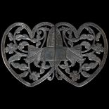 A Victorian silver nurse's buckle, heart-shaped with interwoven floral decoration, hallmarks for