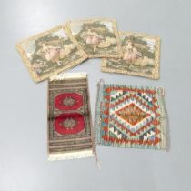 A small red-ground Bokhara mat, 60x30cm, a Chobi Kilim mat, 49x49cm, and three tapestry cushion