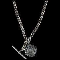 An early 20th century silver curb link Albert chain necklace, with T-bar and fob, overall length
