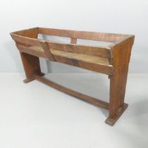 An antique stained pine hay trough. 156x78x47cm.
