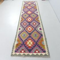 A Maimana Kilim runner. 293x77cm.