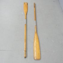 A pair of two-section oars. Length 166cm.