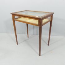 A Victorian mahogany and satinwood strung bijouterie table. 64x69x42cm.