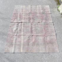 A contemporary wool carpet. 291x220cm. Very faded, and in need of a good clean.