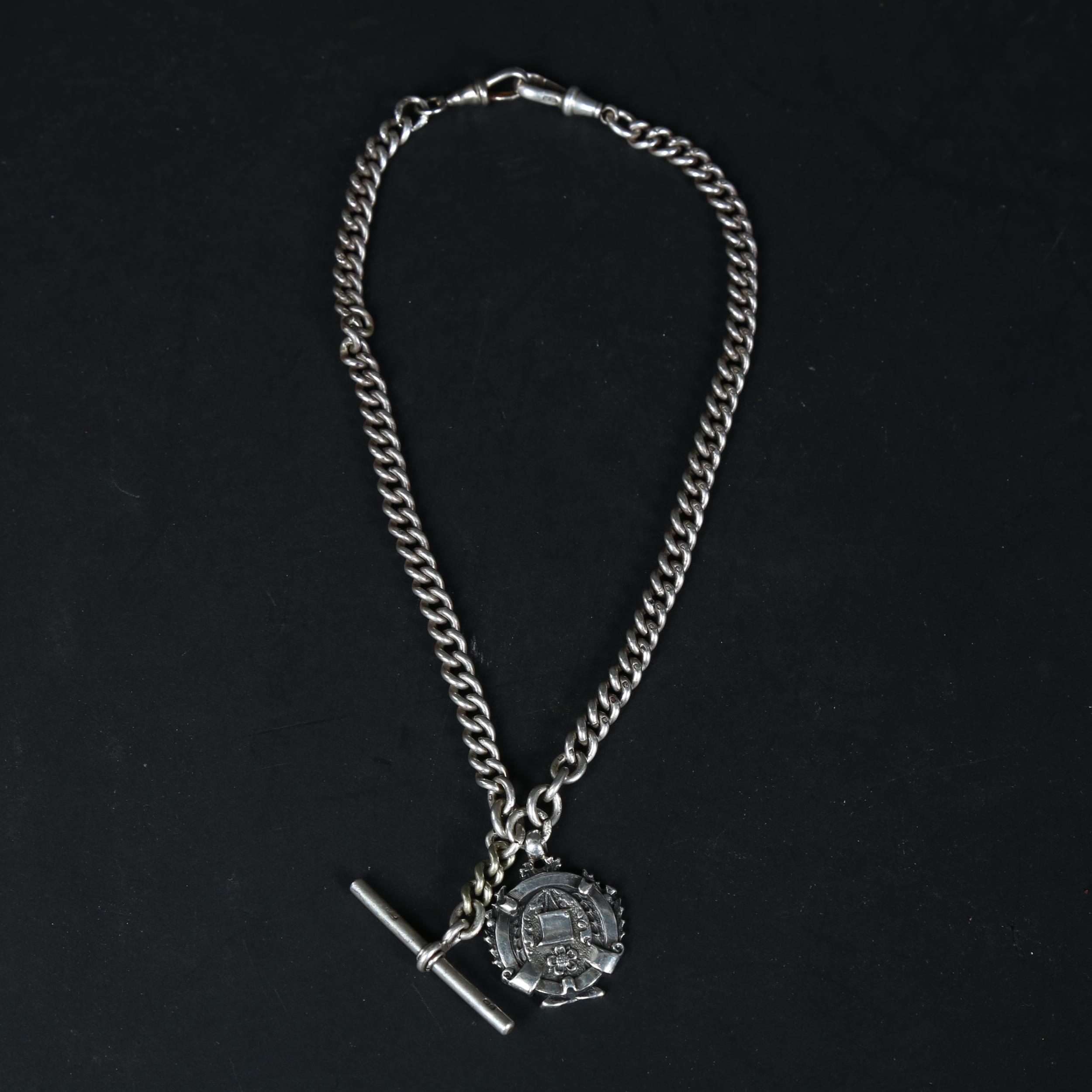 An early 20th century silver curb link Albert chain necklace, with T-bar and fob, overall length - Image 2 of 2