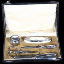 Circa 1920s, a 5-piece cased manicure set, silver mounts, hallmarks for Birmingham 1923, and 1