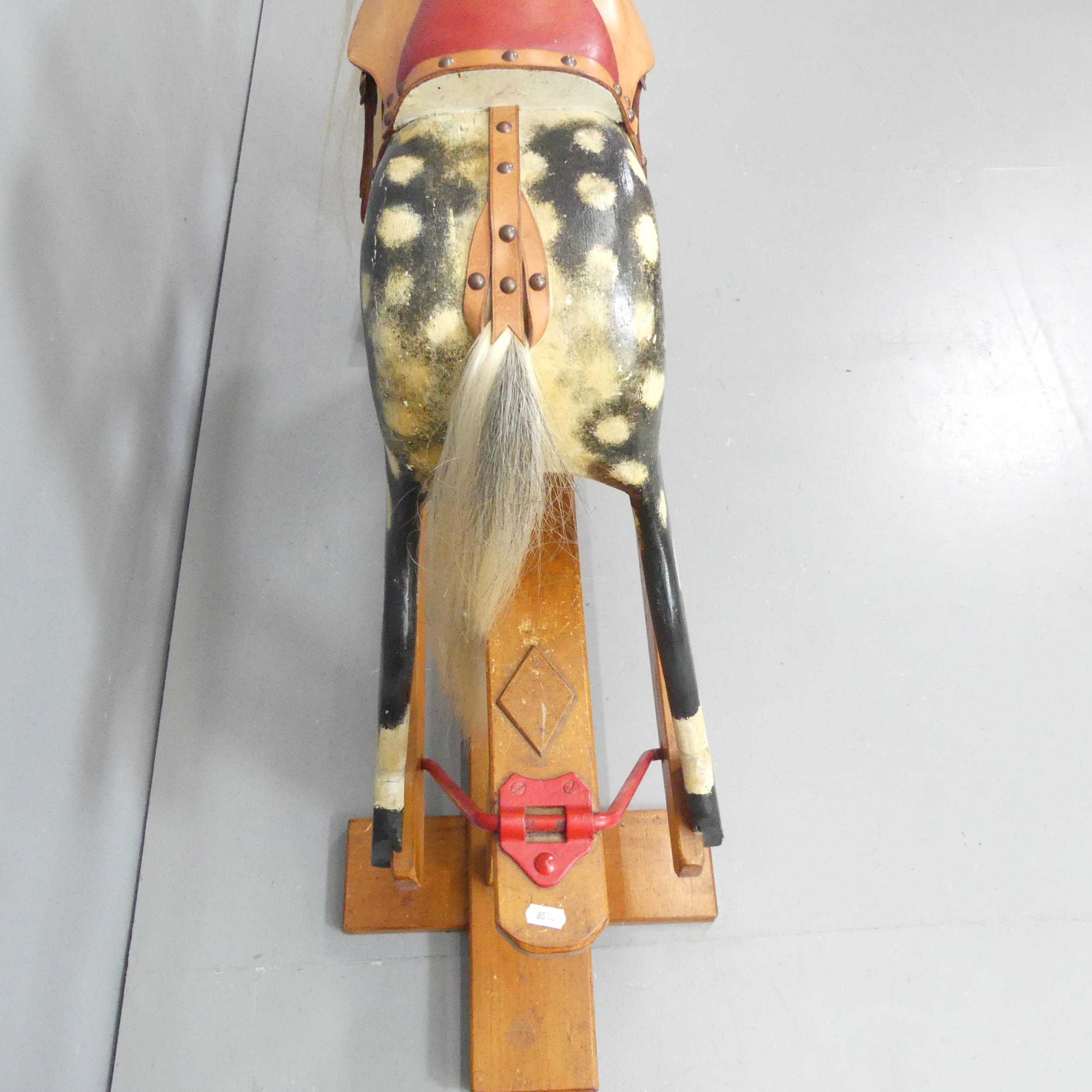 A painted rocking horse on stand, with carved detail and horse-hair maine and tail. Vendor informs - Image 4 of 5