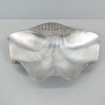 A large alloy wine cooler in the form of a clamshell. 66x18x50cm.