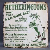 An early 20th century white and green enamel advertising sign for Hetherington's College Restaurant,