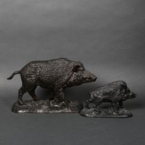 A large cast bronze sculpture of a wild boar, length 31cm, marked to the underside "Korniluk", and