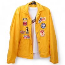 A vintage American JANTZEN 'COACH' JACKET with embroidered motor racing patches and a vintage FENDER