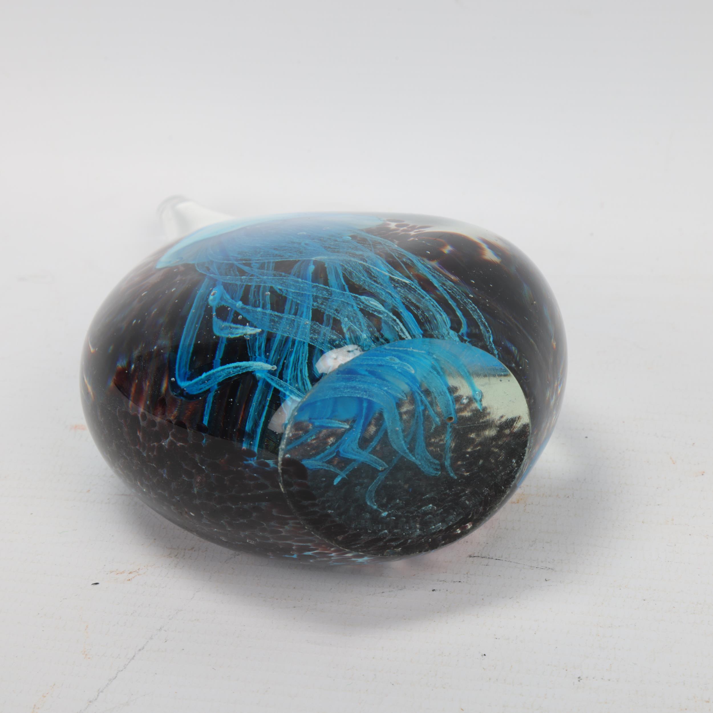 An elongated hand made glass paperweight, with internal blue jellyfish on spotted amethyst - Image 3 of 3