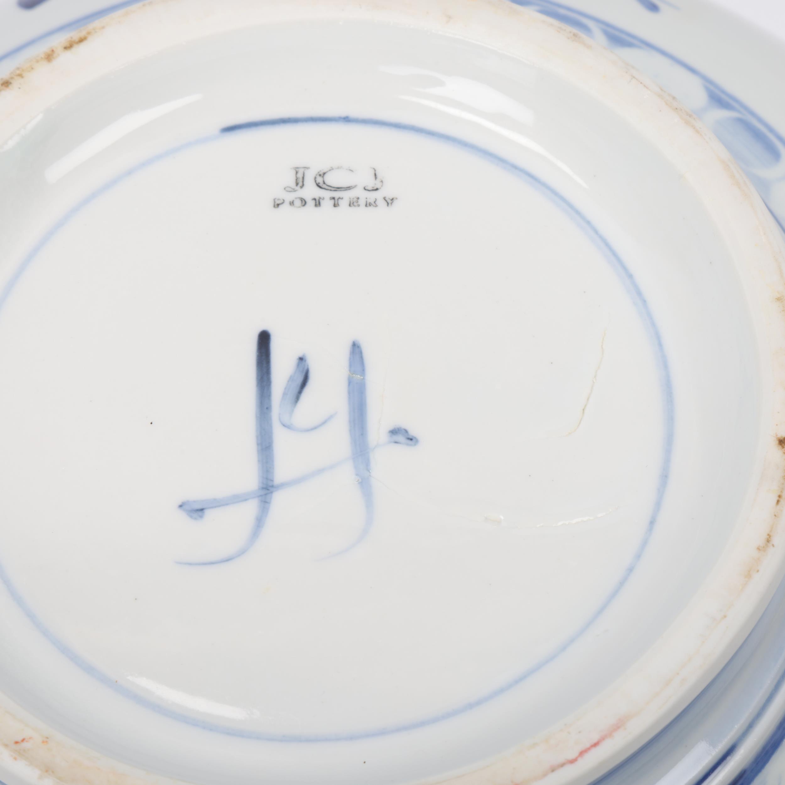 JONATHAN CHISWELL JONES, a studio pottery porcelain bowl with blue and white floral painted glaze, - Image 3 of 3