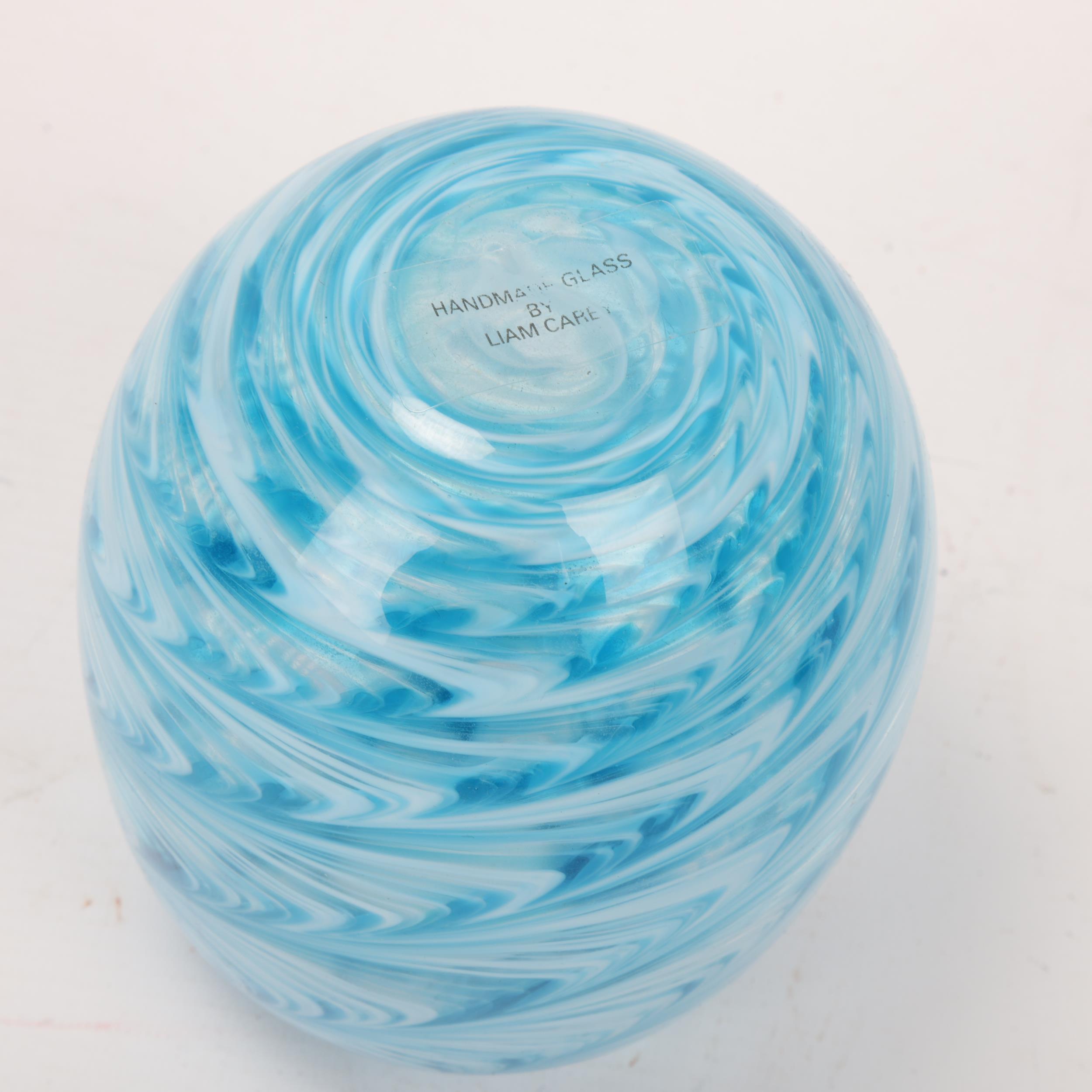 LIAM CAREY, a hand made swirled blue/white glass vase, makers label to base, height 14cm Good - Image 3 of 3