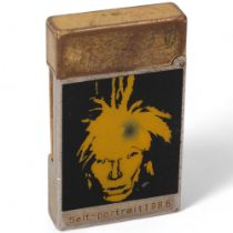 An limited edition ANDY WARHOL self-portrait Line 2 lighter by S.T.Dupont, Paris, dated 1986, makers