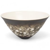 PETER LANE (b.1932) - a studio pottery porcelain bowl, with matt black resist patterned glaze,
