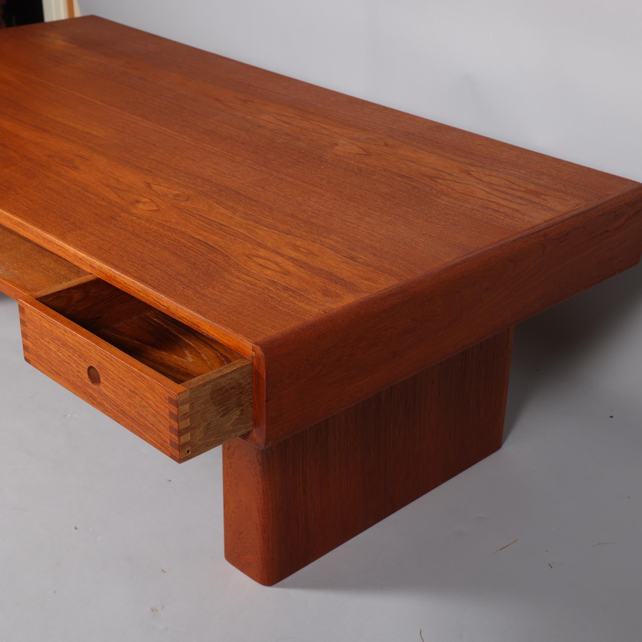 A mid 20th century teak coffee table by Trioh, Denmark, with two double sided sliding drawers and - Image 2 of 3