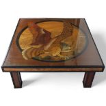 CHARLES SMITH (1947-2017), a 1970s' hand made coffee table, with plywood eagle design under glass,