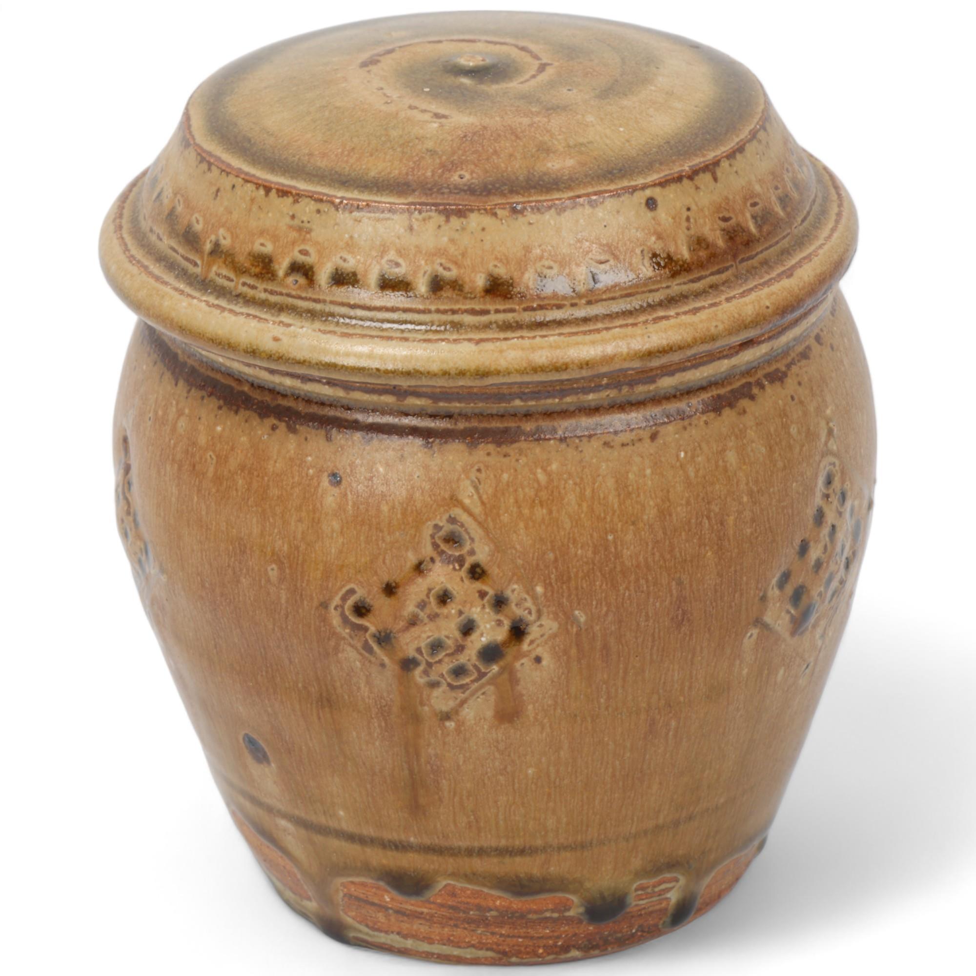 MIKE DODD, (b.1943), a stoneware storage jar with impressed decoration and ash glaze, makers mark