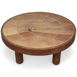 BARROIS, Valllauris, France, a 1960s'/70s' round tile-top coffee table, with stained beech plywood