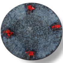 A mid century Brutalist wall hanging plate, with matt blue glaze and red accents, unsigned, diameter