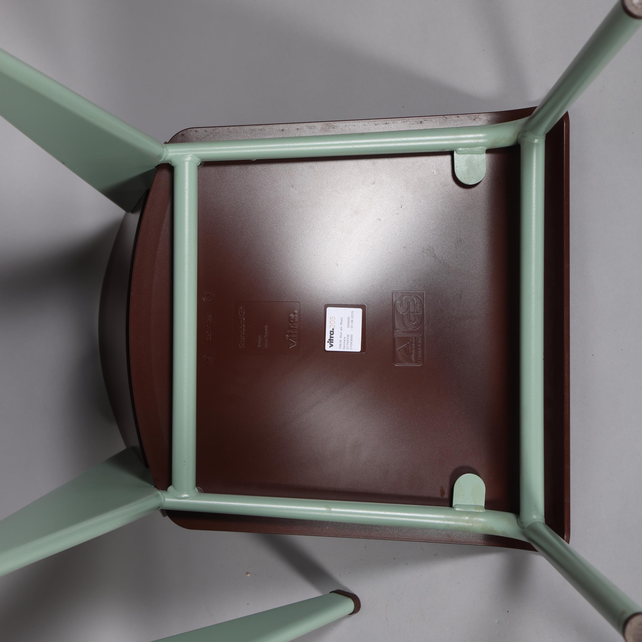 JEAN PROUVE - A set of four Vitra Standard SP chairs, marron seat on mint base, with maker's - Image 3 of 3