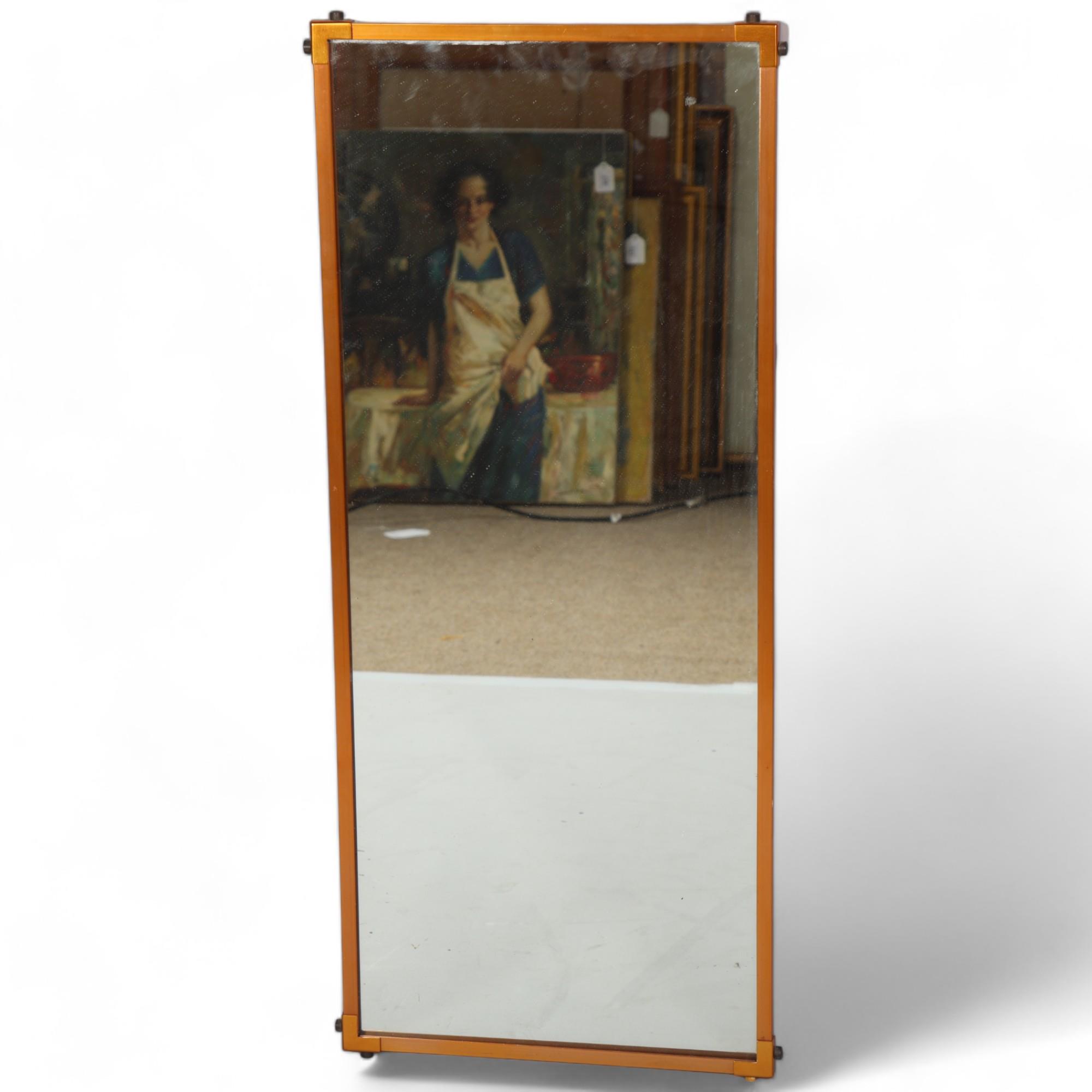 A 1920s'/30s' Modernist wall mirror, with copper plated surround, 81 x 34cm Good condition, one