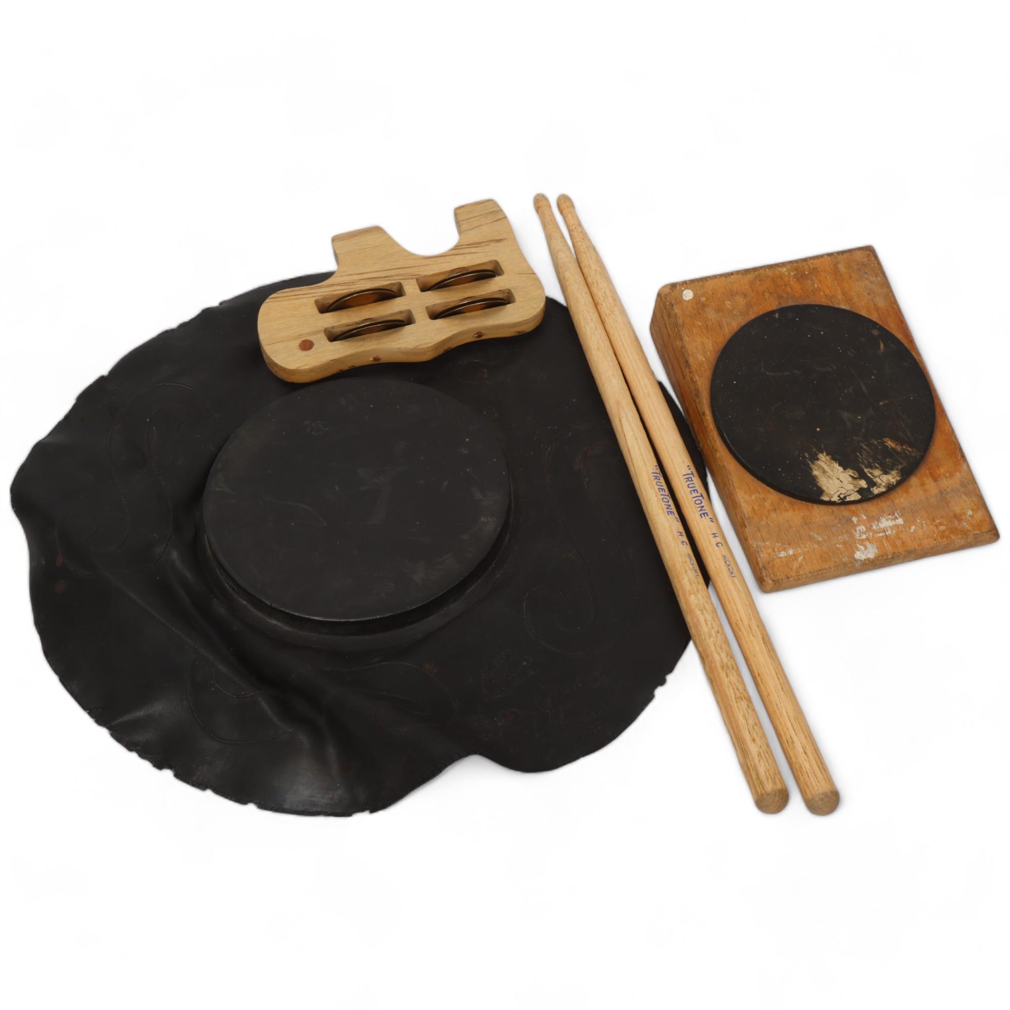 Two Practice DRUM PADS, two USED 'TRUETONE' DRUM STICKS and an ELEPHANT TAMBOURINE owned by MITCH