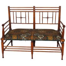 Liberty and Co, an Arts and Crafts Argyll 2 seater bench settee, ca 1890, later upholstered with