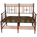 Liberty and Co, an Arts and Crafts Argyll 2 seater bench settee, ca 1890, later upholstered with