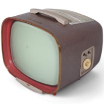 A 1950s' Kolster Brandes, KB Royal Star Television Set, pink body, 17 inch screen, on red feet and