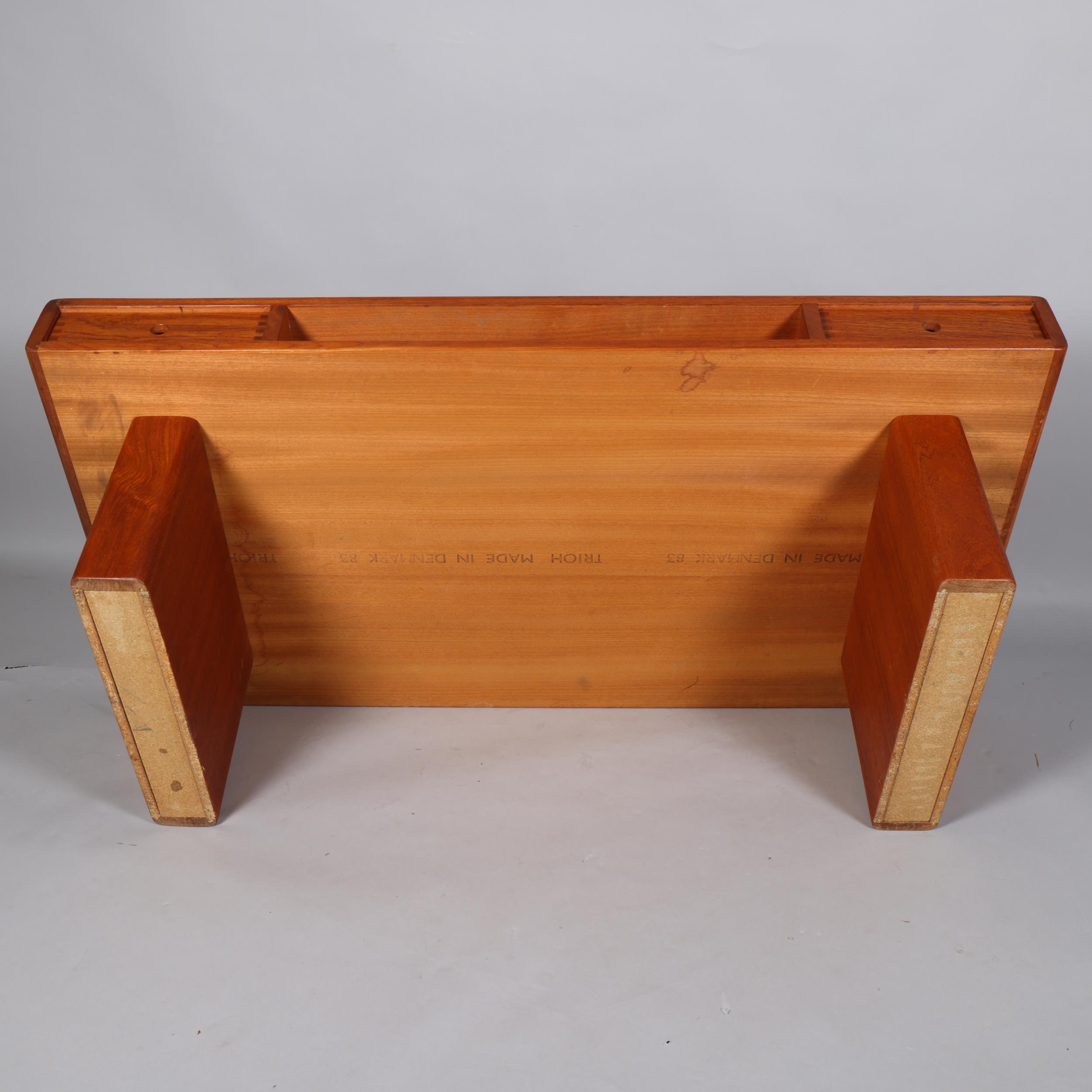 A mid 20th century teak coffee table by Trioh, Denmark, with two double sided sliding drawers and - Image 3 of 3