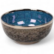 CAROLINE & STEPHEN ATKINSON-JONES, a slip-cast fruit bowl, with silver lustre glaze, signed to base,