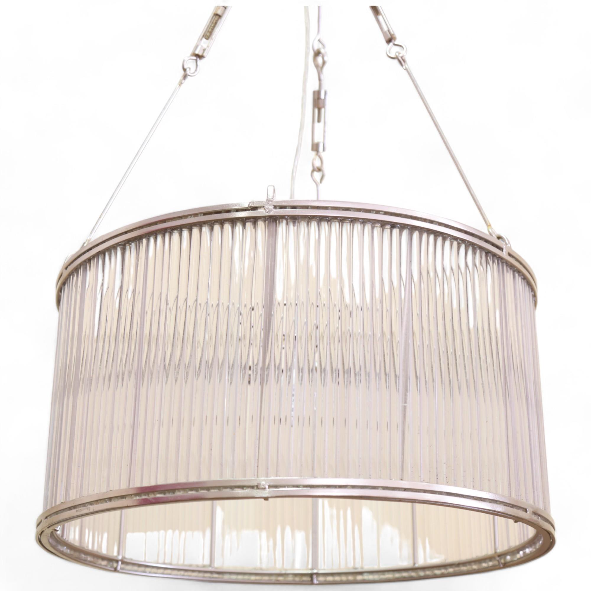 A large steel frame and crystal rod pendant light, drop approx 95cm, diameter 50cm Some pitting to