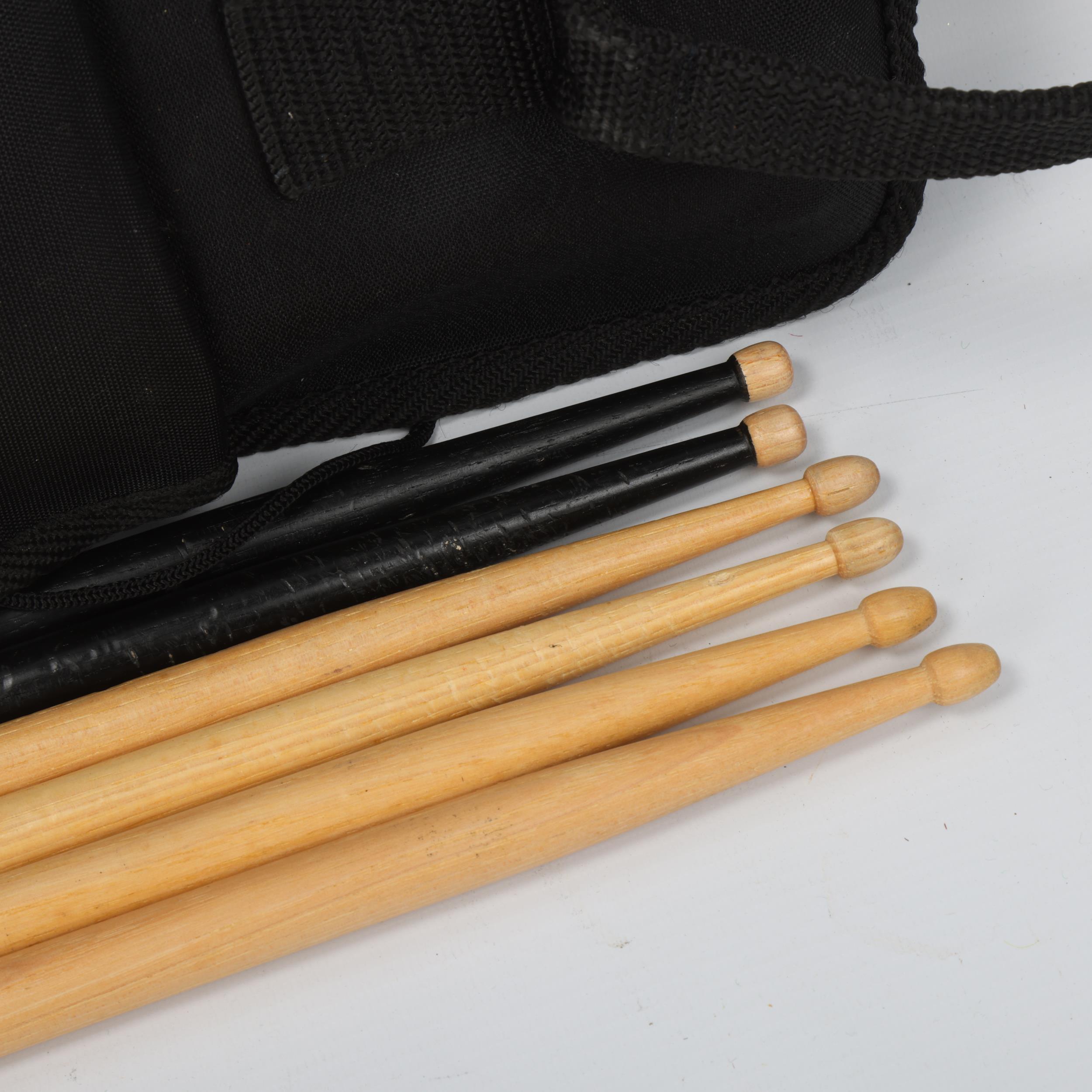 A PRO-MARK STICKBAG containing six drumsticks. Two VIC FIRTH American Classic 5As (unused), two - Image 3 of 3