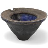 DAVID HOWARD JONES (b.1953), a thrown and altered raku vessel, blue metallic glaze to interior and