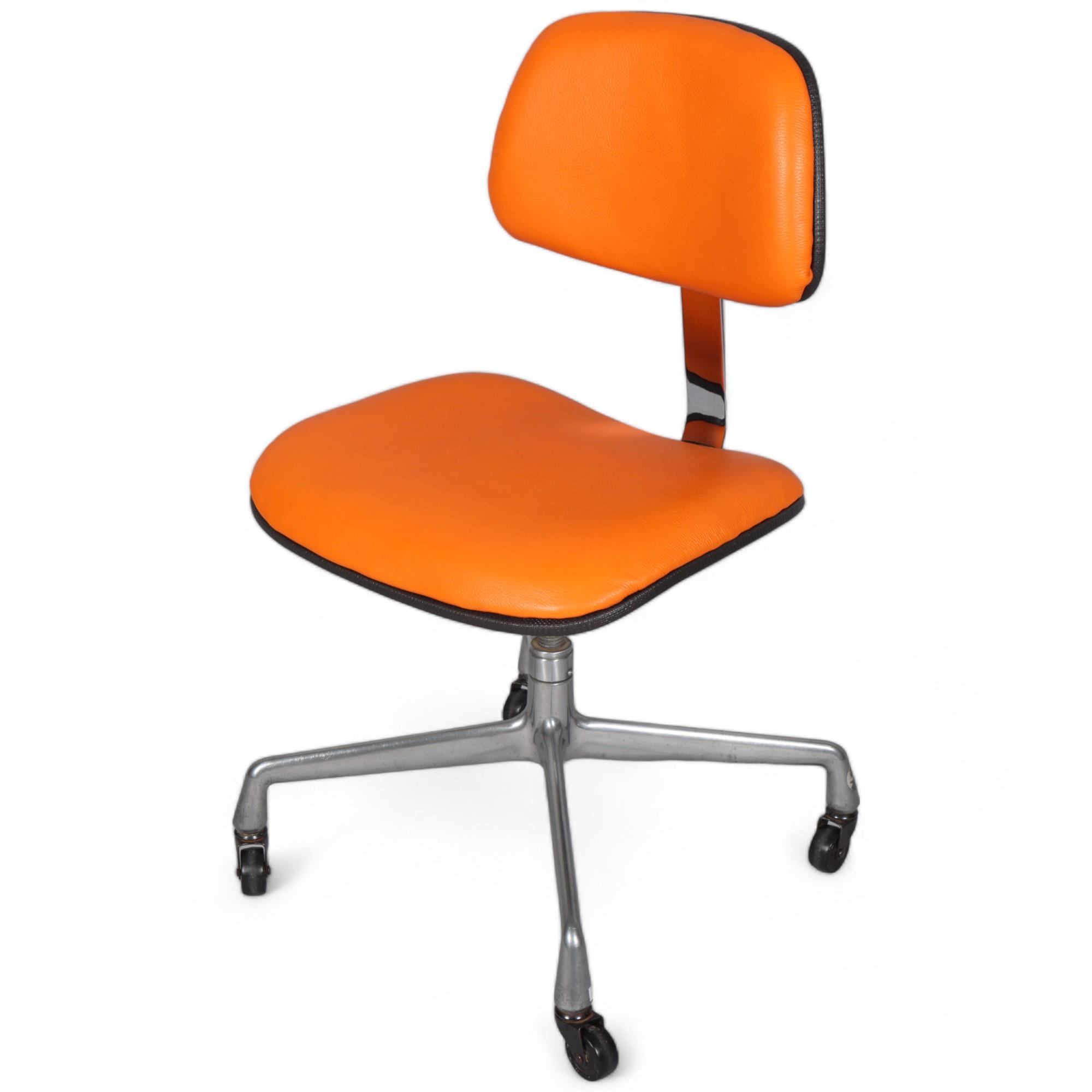 CHARLES EAMES, a rare Herman Miller EC228 secretarial chair, 1971, with orange leather upholstery,