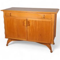 ANDREW J MILNE FOR HEAL'S - a Mid-Century blonde wood sideboard, circa 1952, frieze drawer with